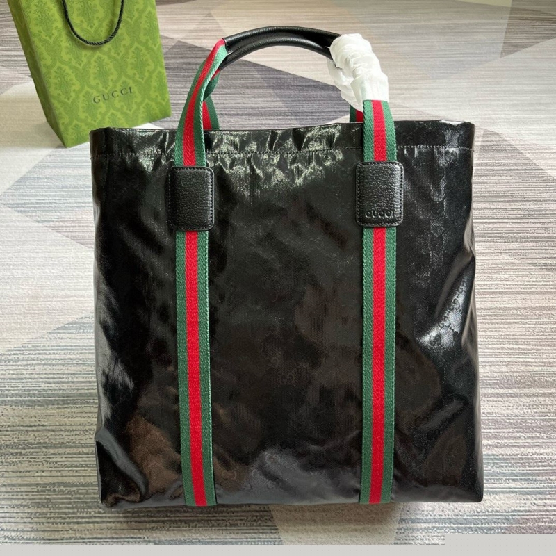 G*u*i shopping bags